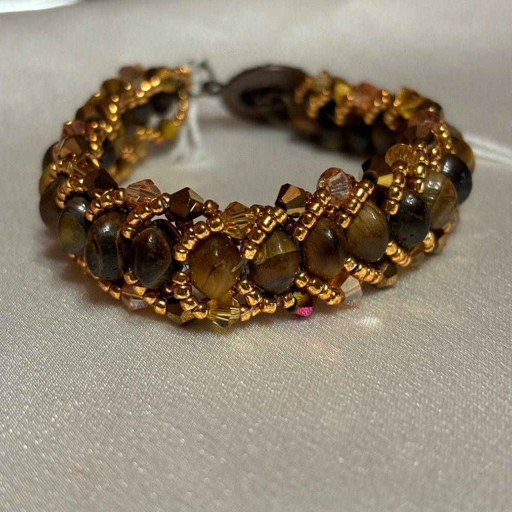 Tiger eye bracelet with Smokey topaz and gold tone beads 7.5 inches